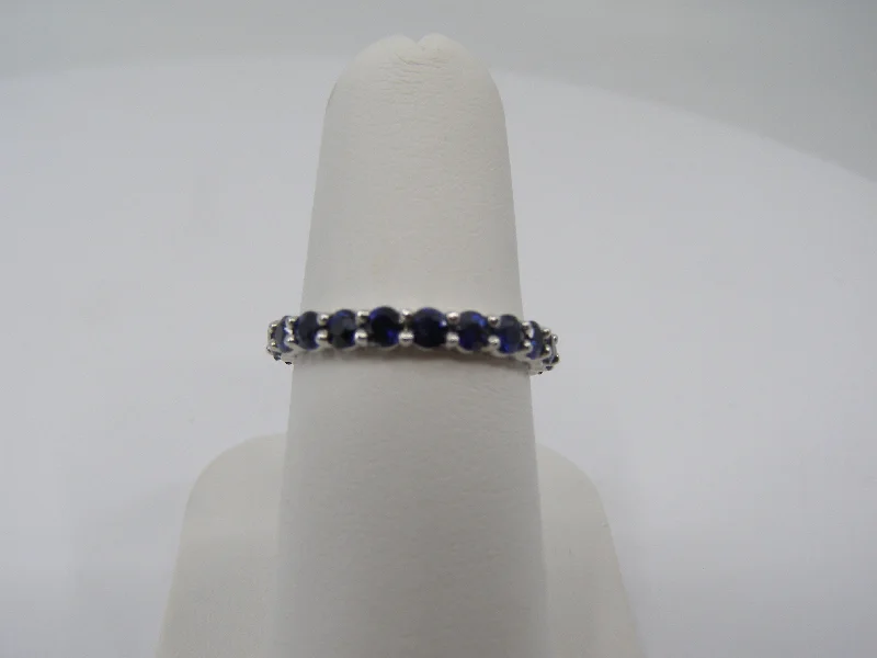 14KT WG SAPPHIRE ETERNITY BAND(2.18CTW 22 RD. SAP)